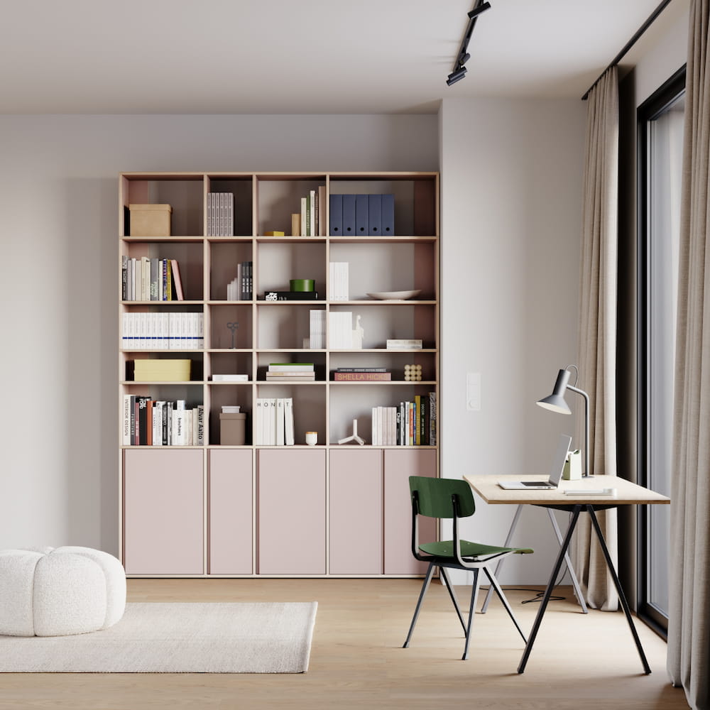 A subtly coloured Dusty Pink Type 02 Wall Storage reaches to nearly the ceiling of a pale, peaceful workspace with five even rows of open storage stacked above two rows of closed door and drawer storage for perfect balance.